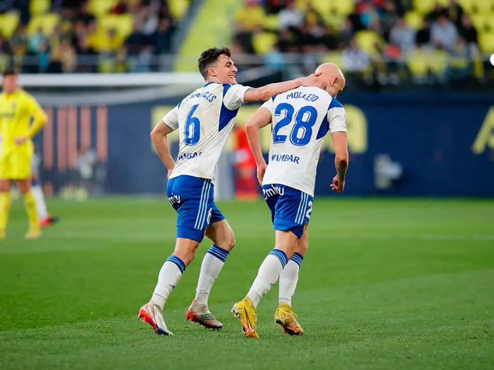 Franc&eacute;s y Mollejo celebran un gol