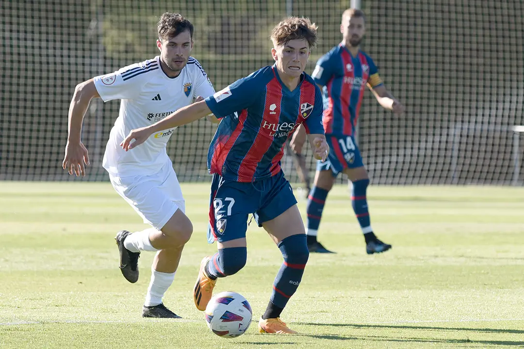 Los de Ziganda han sabido dar la vuelta al partido en una segunda parte en la que ambos equipos se han quedado con diez hombres. Fotograf&iacute;a: S.D. Huesca.