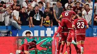Los jugadores del Alcorc&oacute;n celebran ante la grada zaragocista