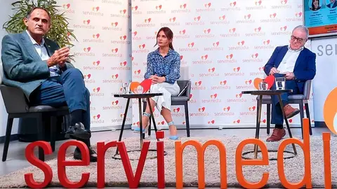 Foto de algunos de los ponentes durante la charla