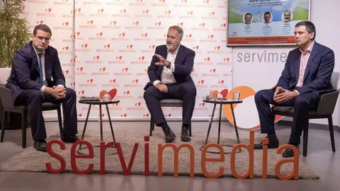 Los ponentes en un momento de la charla